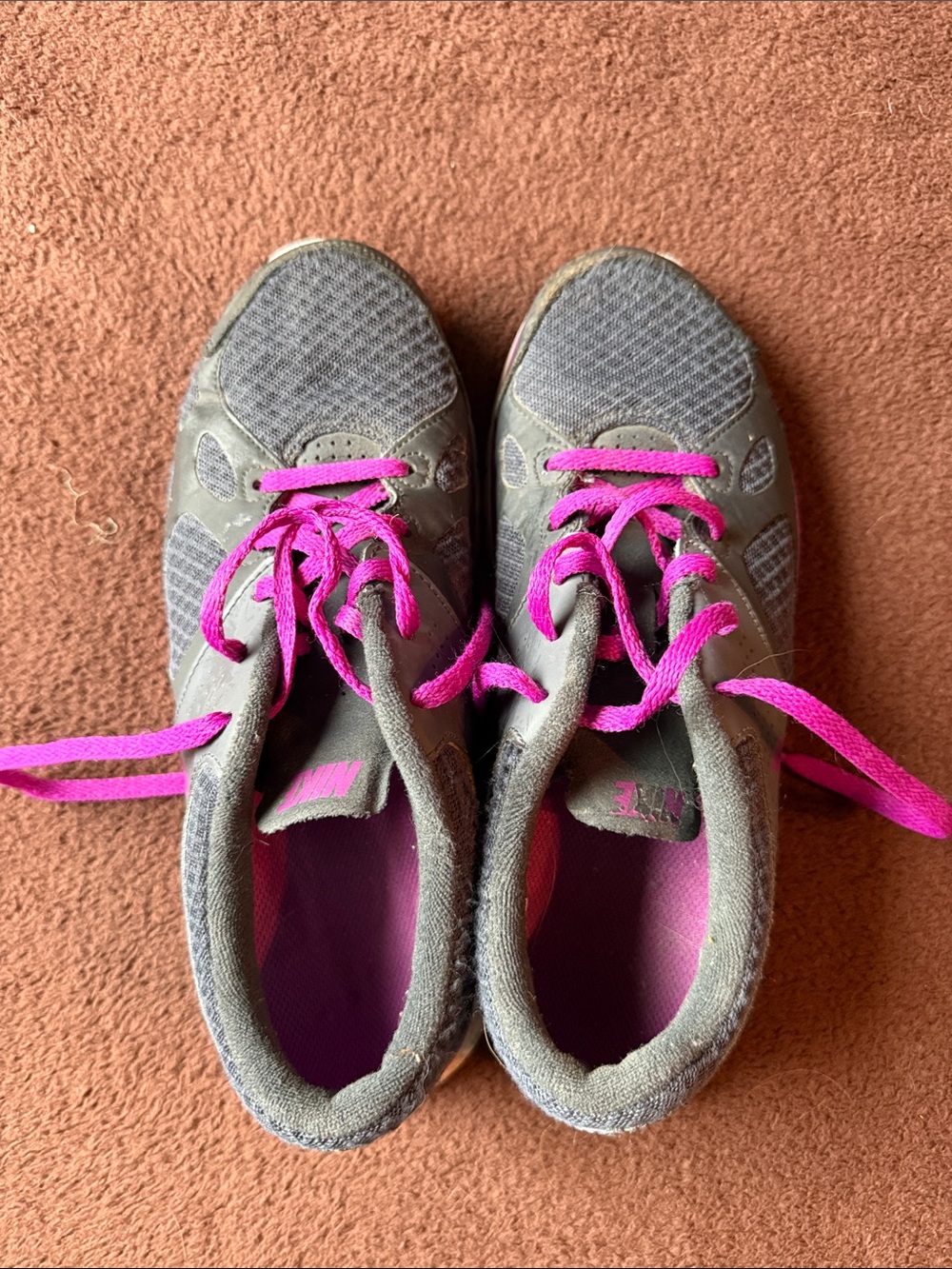 Nike women’s Gray Sneakers with Bright Pink Laces